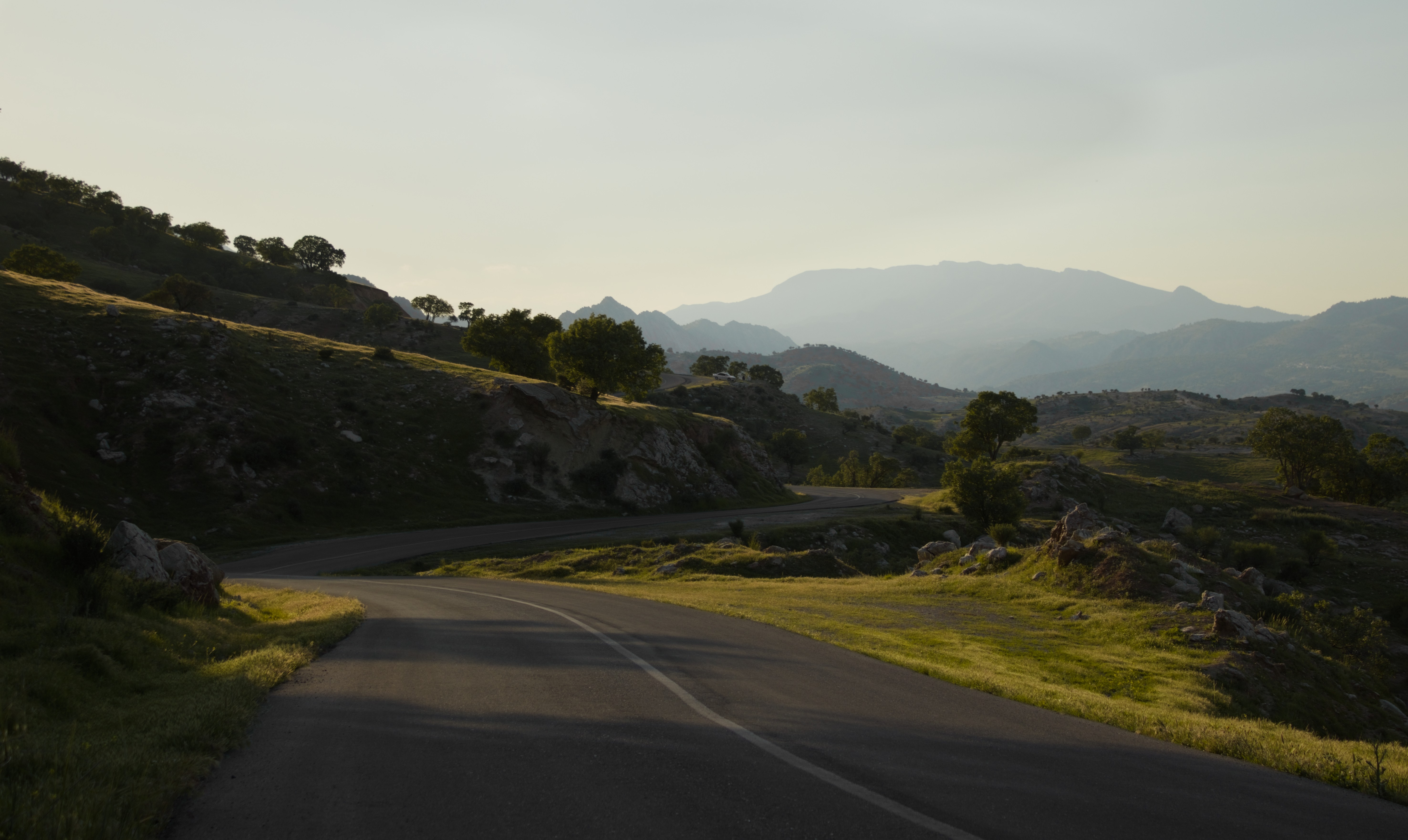 Curvy road going through mountains